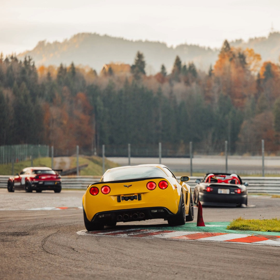 Corvette jumping Kerbs during a GP Days Open Pitlane Track Day at Salzburgring